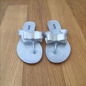 Women Michael Kors silver bow slippers size 8